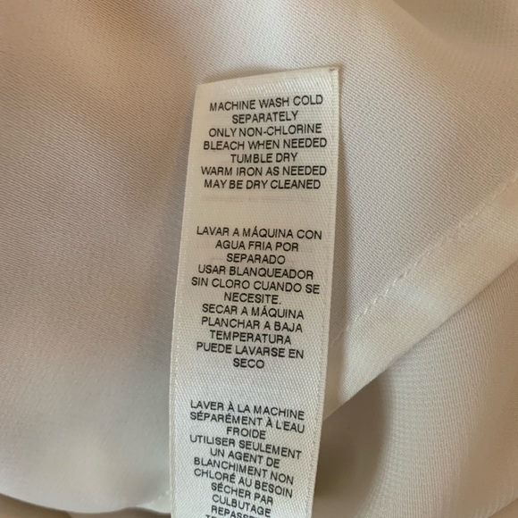 Chico’s, size 1 (8-10). Lovely top, ivory background, twist accent at neck. - Picture 6 of 9